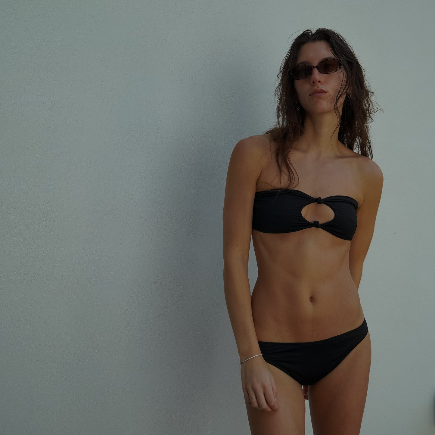 black bikini set. black bandeau cut out bikini top. black bikini set. black bandeau bikini